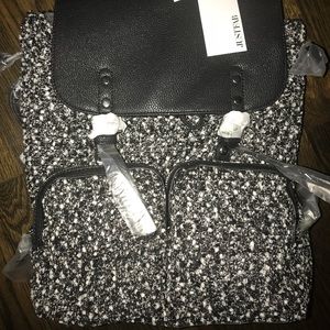 New black and white tweed backpack.